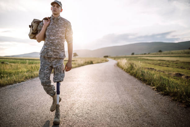 istock Young Amputee Soldier Coming Home 987040912