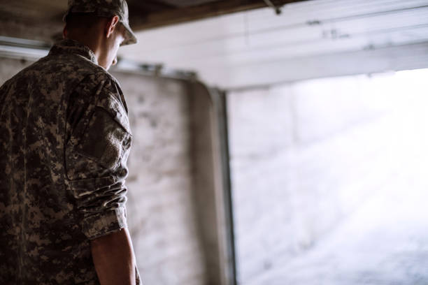 istock Young Soldier Coming Home From War 987041496