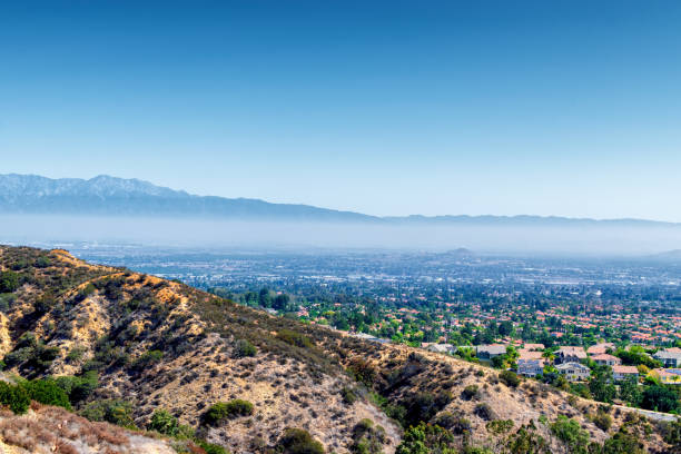 istock Morning haze over suburbs 987054108
