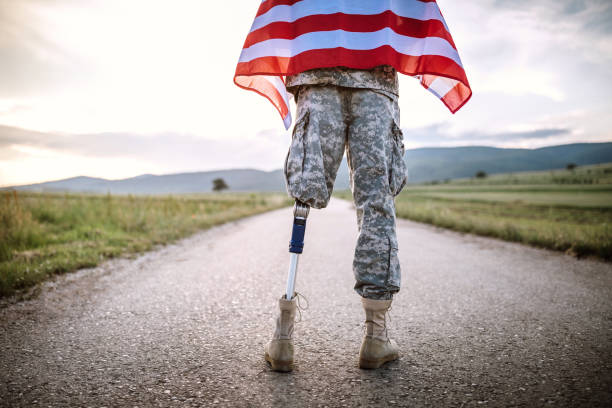 istock American Amputee Soldier On Road 987055366