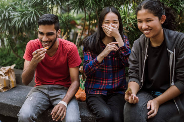 istock Group Of Students Joking And Getting To Know Each Other 987123150