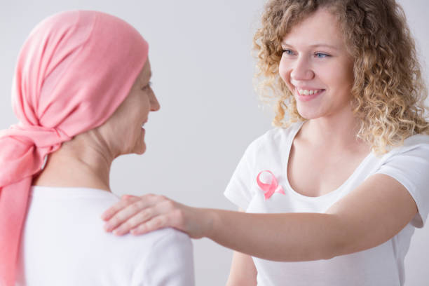 istock Daughter touching mother's shoulder 987130284