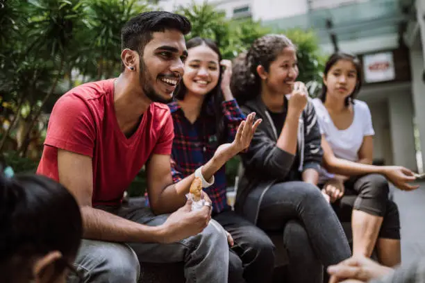 Photo of Group Of Students Joking And Getting To Know Each Other