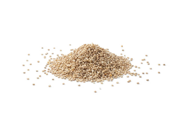 istock Pile of white quinoa seeds 987194518