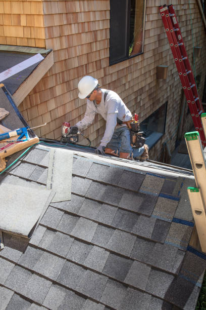 istock Installing new roof with nail gun 987223836