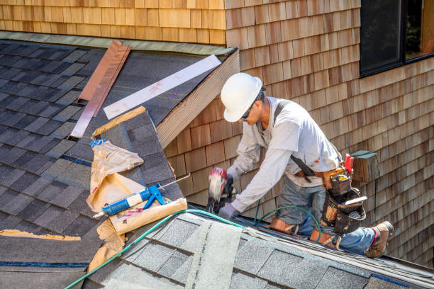 Installing new roof with nail gun