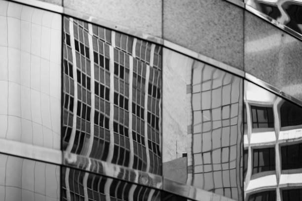 istock Modern office building detail, glass surface in Black & white color 987225514