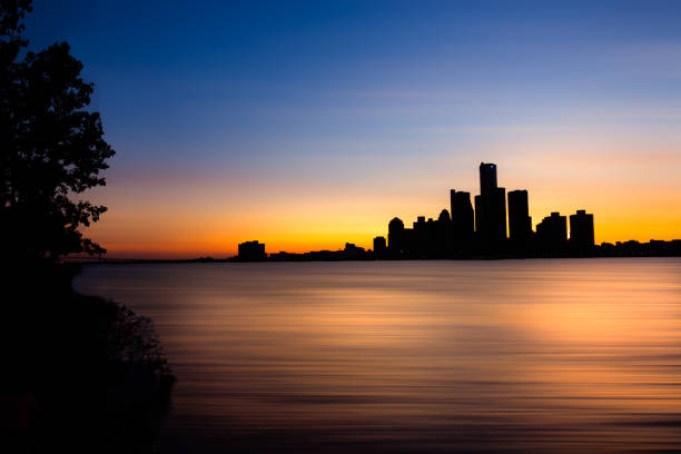istock Silhouetted Detroit Skyline at Dusk 987235254