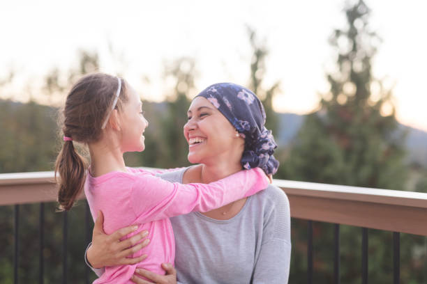 istock Mother with Cancer Hugging Daughter 987237260
