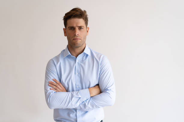 istock Tensed young man looking at camera 987268858