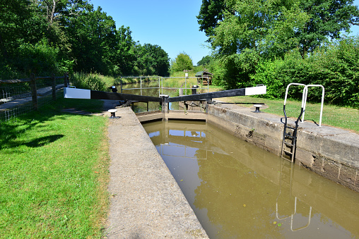 A Canal Lock on the Wey and Arun  canal in England in summertime