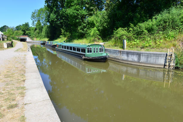 istock Barge moored on the Wey and Arun Canal 987283818