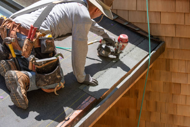 istock Installing new roof with nail gun 987289066