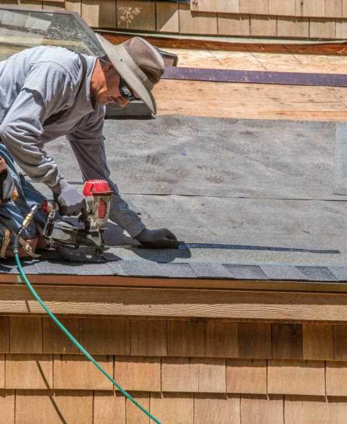 istock Installing new roof with nail gun 987290142