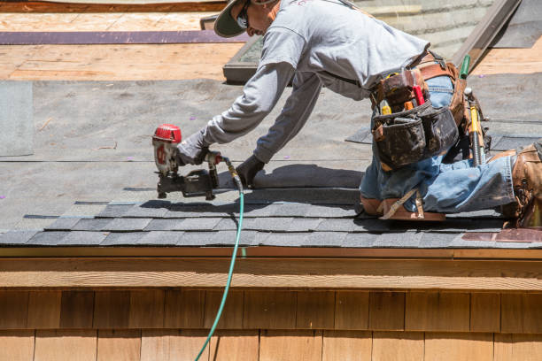 istock Installing new roof with nail gun 987291066