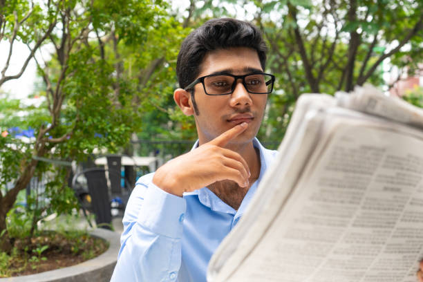 istock Focused pensive broker starting his day 987295126