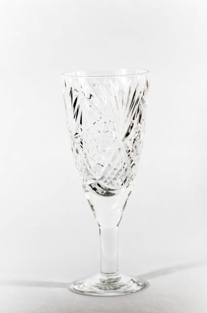 istock Glass of white on white background 987298268