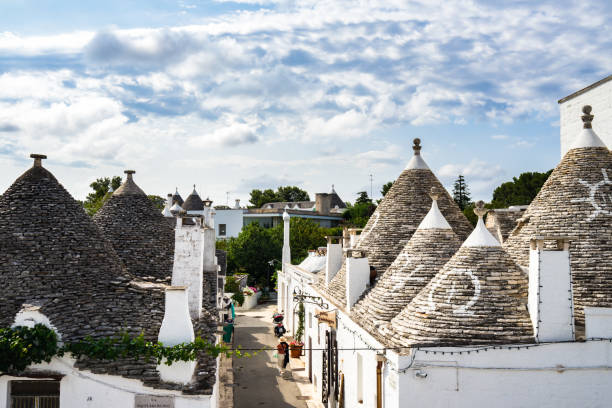 istock The trulli of Alberobello, with conical rooftops composed of overlapping stone circles, Apulia, Italy 987314902