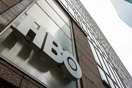 New York City. Logo of Home Box Office (HBO), an American premium cable and satellite television network, in the HBO Shop at Sixth Avenue (Avenue of the Americas)
