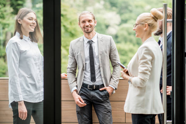 istock Business people on the office balcony during a break 987323910