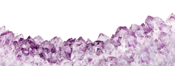 macro photo of lilac amethyst crystals isolated on white background