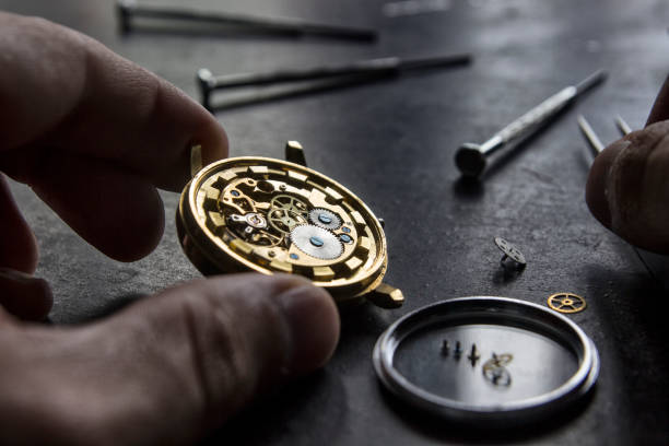 istock Watchmaker is repairing the mechanical watches in his workshop 987334514