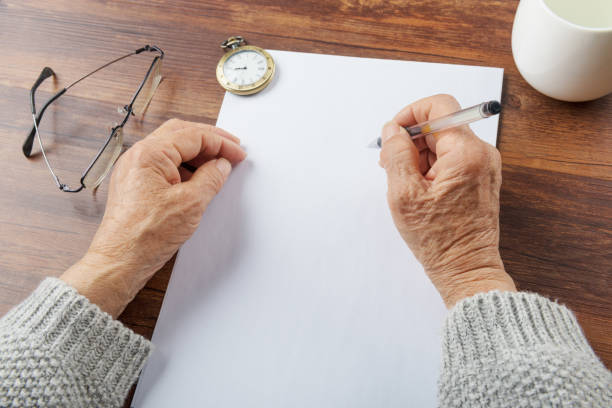 istock Old grandmother writing letters 987337944