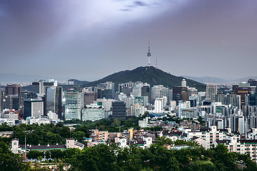 Seoul cityscape seen from above - South Korea. A modern growing skyline .