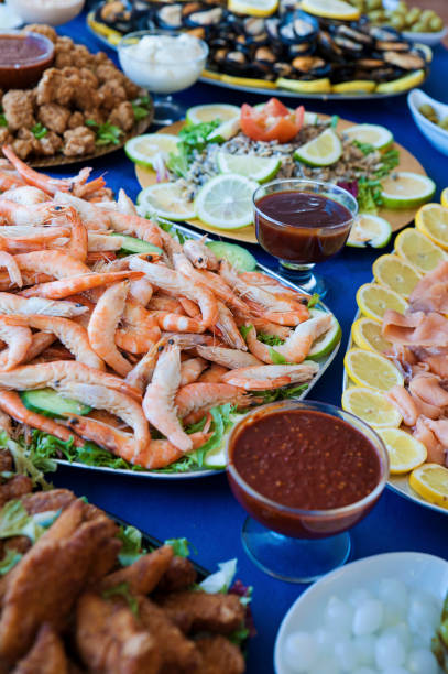 Selection of cold bits, predominantly seafood at a buffet bar, or self-service restaurant