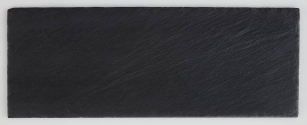istock Dark grey and black slate granite background. 987358614