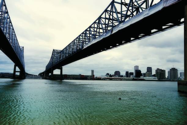 istock Bridge and New Orleans skyline. 987359662
