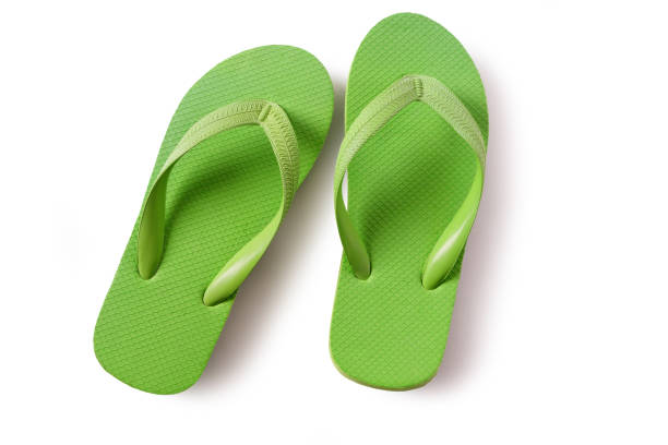 Flip flop beach shoes green isolated on white background - fotografia de stock