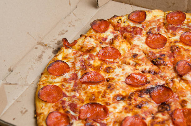 istock Slice of pepperoni pizza 987362532