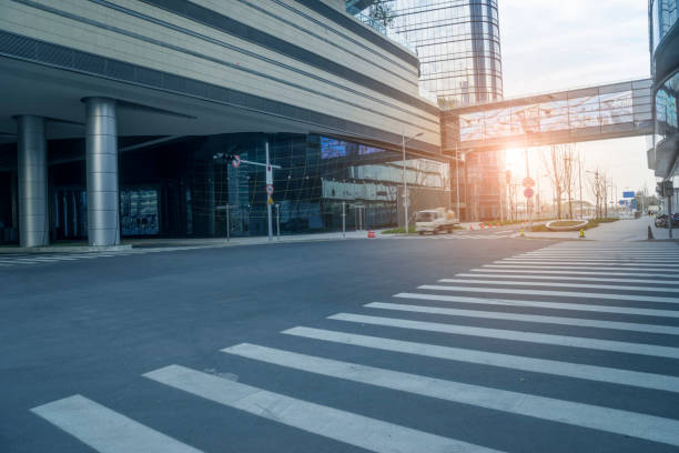 istock empty road with cityscape in modern city 987364930