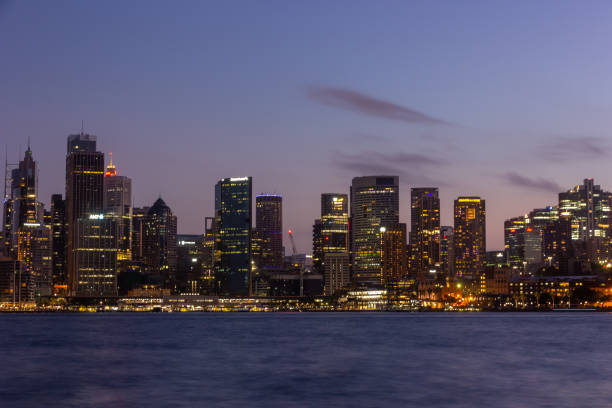 istock Sydney at dusk with skyscapers illuminated 987371006