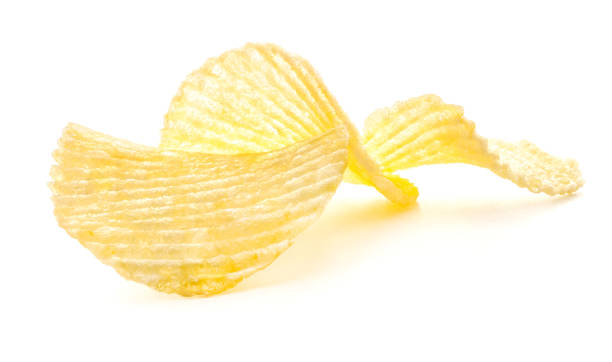 istock Rippled potato chips isolated on white background 987375048