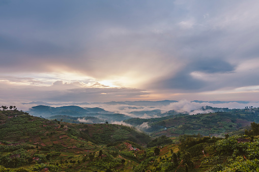 Puesta de sol sobre las colinas de Ruanda photo