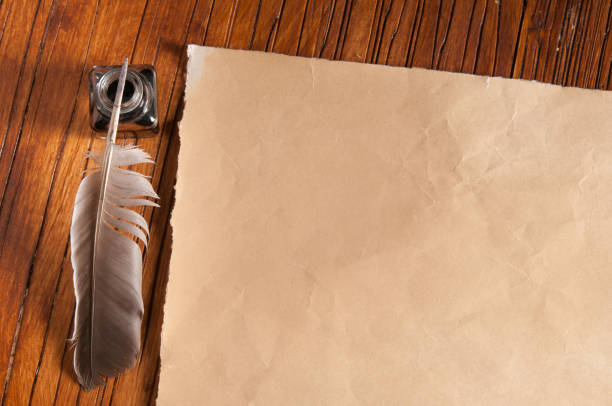 istock Quill pen and old paper 987382690