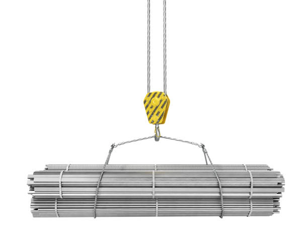 istock Different rolled metal products on a crane hook on a white. 3d illustration 987384748