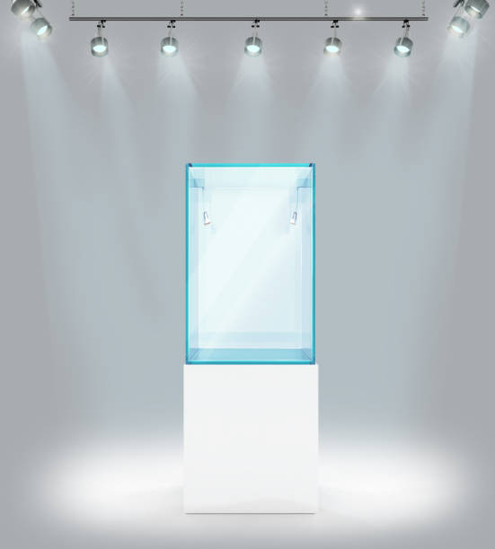 istock Empty showcase with searchlights, Against the gray wall. 3d illustrations 987385194