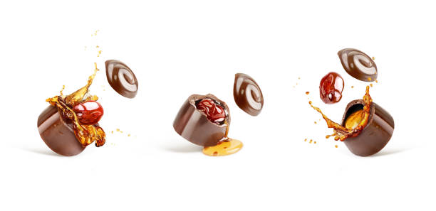 istock A set of chocolate sweets with cognac and cherry isolated on white background 987387700