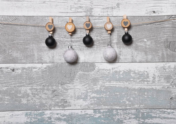istock Weathered screen of boards with Christmas decoration 987391838