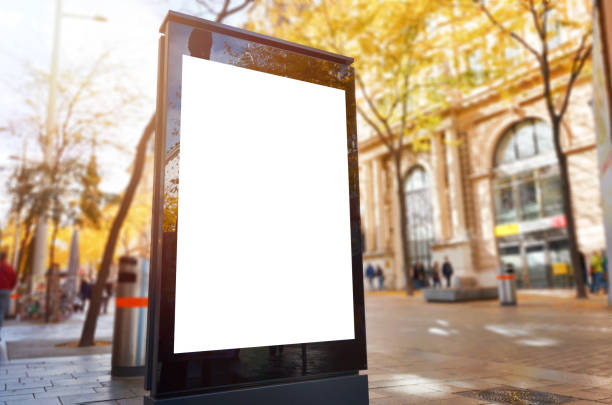 istock Isolated city billboard for design presentation. Walking area in background. 987393826