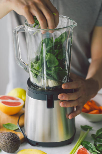 istock Process of making healthy smoothie 987396612