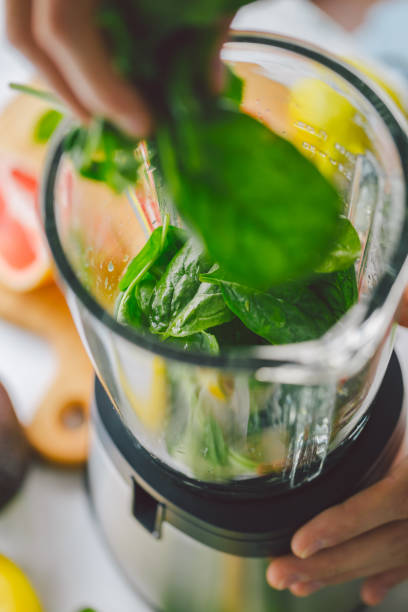 istock Process of making healthy smoothie 987396644