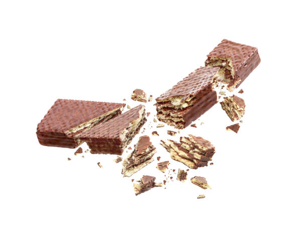 istock Chocolate Waffles broken into pieces, isolated on a white background 987409416