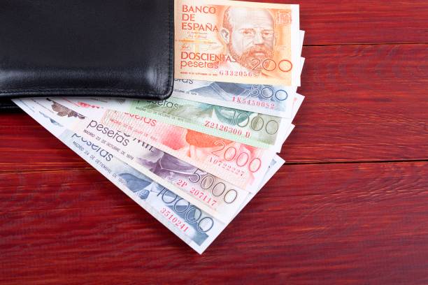 istock Money from Spain in the black wallet 987417112
