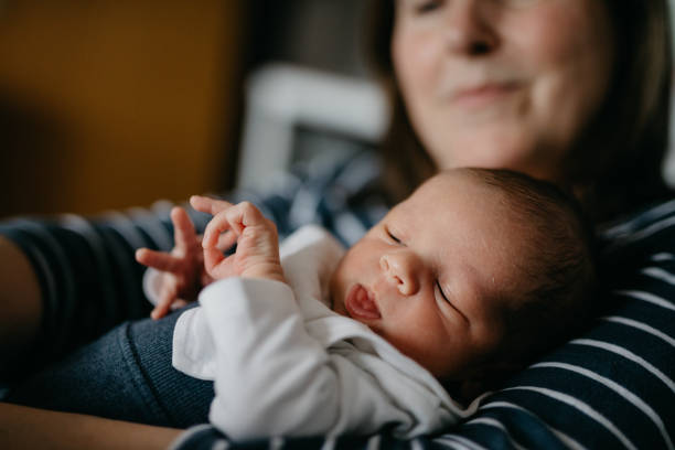 istock Grandmother embracing her grandson 987442292