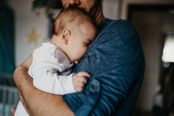 istock Dad soothe crying colic baby 987449970