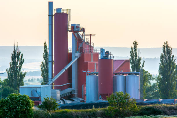 istock An asphalt factory surrounded by trees 987469140